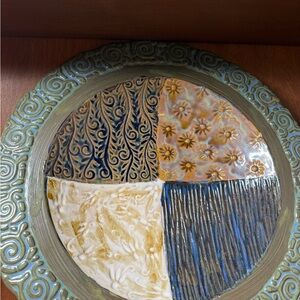 Artistic Ceramic Wall Plate with Intricate Patterns